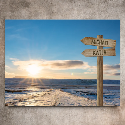 Personalisierte Leinwand mit Wegweiser im Sonnenaufgang, Namen Michael und Katja, Winterlandschaft